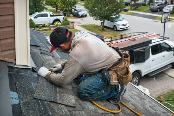 Professional Roofing technician working in Rose Hill, IA